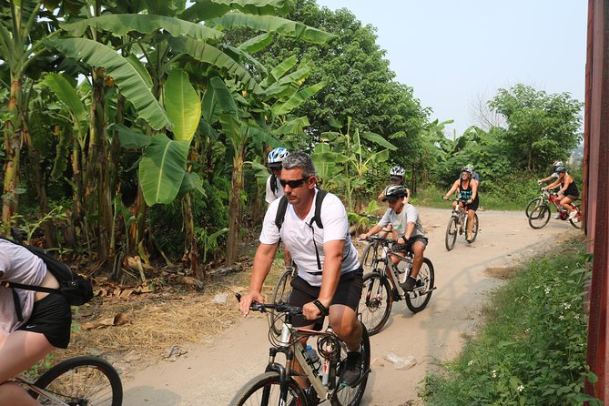 Red River island backroad, Rural Countyside Area and Train Street - Who will enjoy this Hanoi cycling tour