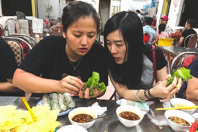 Saigon Afternoon Unseen Street Food by Scooter |Opt: Ao Dai Rider - Banh xeo with wild vegetables at a local restaurant