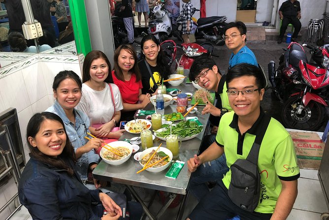 Saigon By Night and Street Food By Motorbike | Opt: Ao Dai Riders - What riding a motorbike is really like
