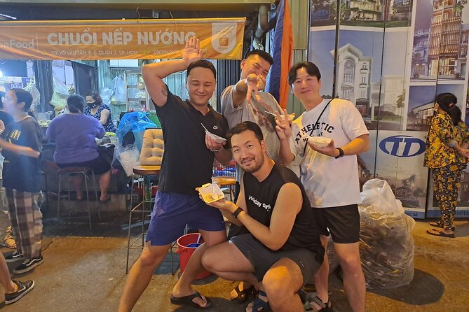 Saigon Food Tour by Scooter with Eleven Tastings - Stop three: Ho Thi Ky Flower Market and unusual snacks