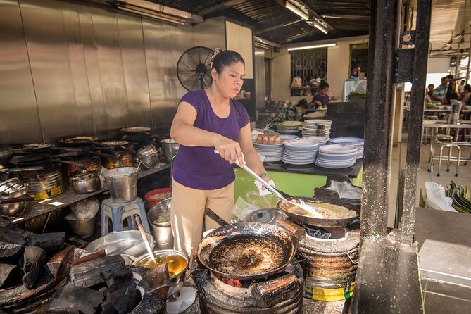 Saigon Night Bites on Foot: Local Vendors, Stories & Sweet Finish - Beer, peanuts, rice crackers, and flan
