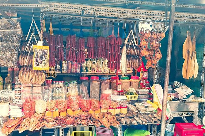 Saigon Night Sights & Local Food by Motorbike| Opt: Ao Dai Riders - District 4 turns dinner into a neighborhood outing