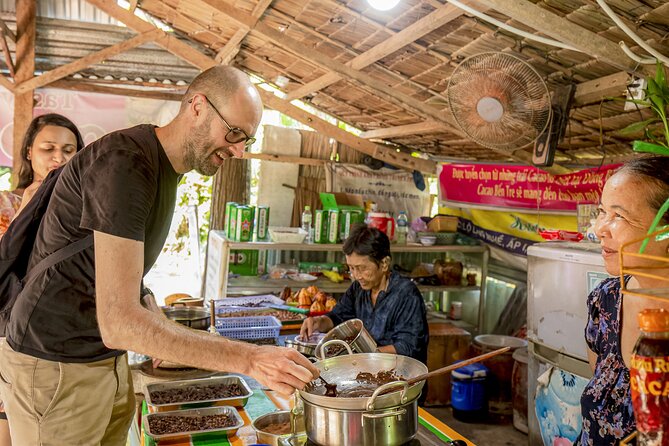 Small-Group Mekong Delta Day Trip: Boat Ride, Cottages & Pagoda - Vinh Trang Pagoda and the return to Saigon