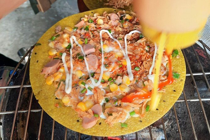 Super Niche Walking Street Food Tour in Ho Chi Minh City - Afternoon lunch or evening dinner