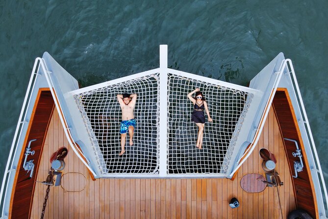 The Halong Catamaran Premium Day Cruise From Ha Long Bay - Bright and Dark Cave, kayaking or bamboo boat