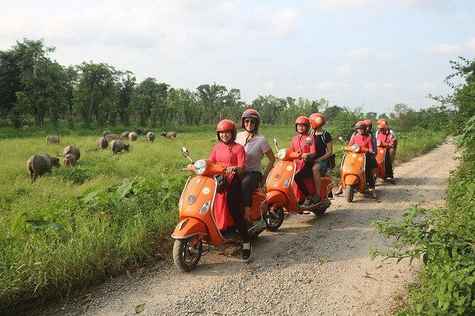 The insider's Hanoi + Train Street 4,5 Hours Female Ao Dai Riders - Ba Dinh Square and Hanoi’s major landmarks