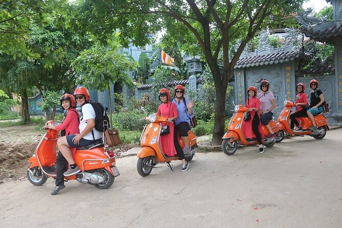 The insider's Hanoi + Train Street 4,5 Hours Female Ao Dai Riders - Lunch, snacks, water, and Hanoi egg coffee