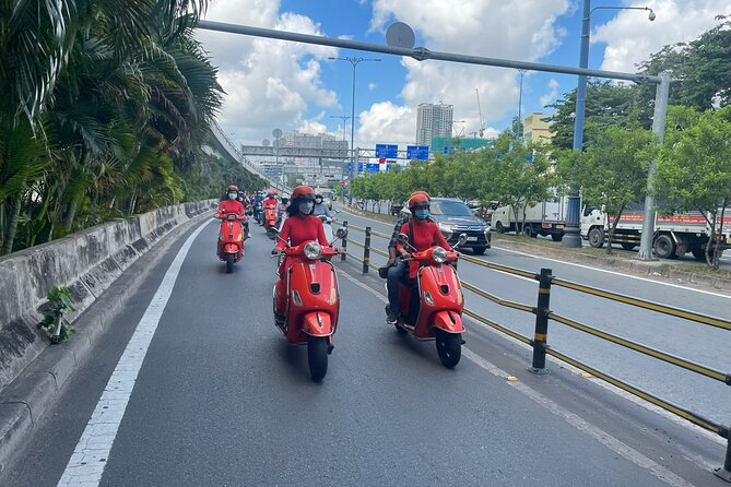 The insider's Hanoi + Train Street 4,5 Hours Female Ao Dai Riders - Crossing Long Bien Bridge above the Red River