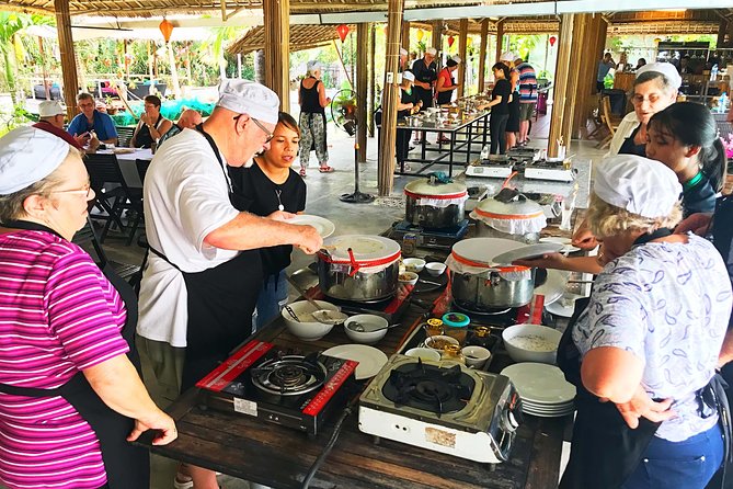 Traditional Cooking Class with Basket Boat Ride and market Tour - Cooking four Vietnamese dishes