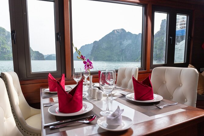 Unique Halong Private Day Cruise - Fishing Village, Kayak - Lunch, the open restaurant, and the sundeck