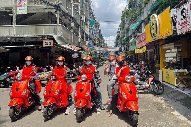 Vespa Female Ao Dai riders Night Street Food + See Train Street - Why a Vespa is the right way to see Hanoi at night