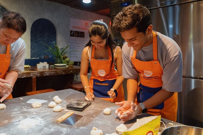 Vietnamese Bread & Brew: Banh Mi Baking Class & Specialty Coffee - Kneading baguette dough from scratch