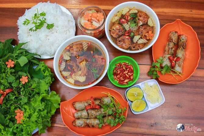Walking Street Food Tour in Hanoi and Train Street - Hanoi food first, Train Street second